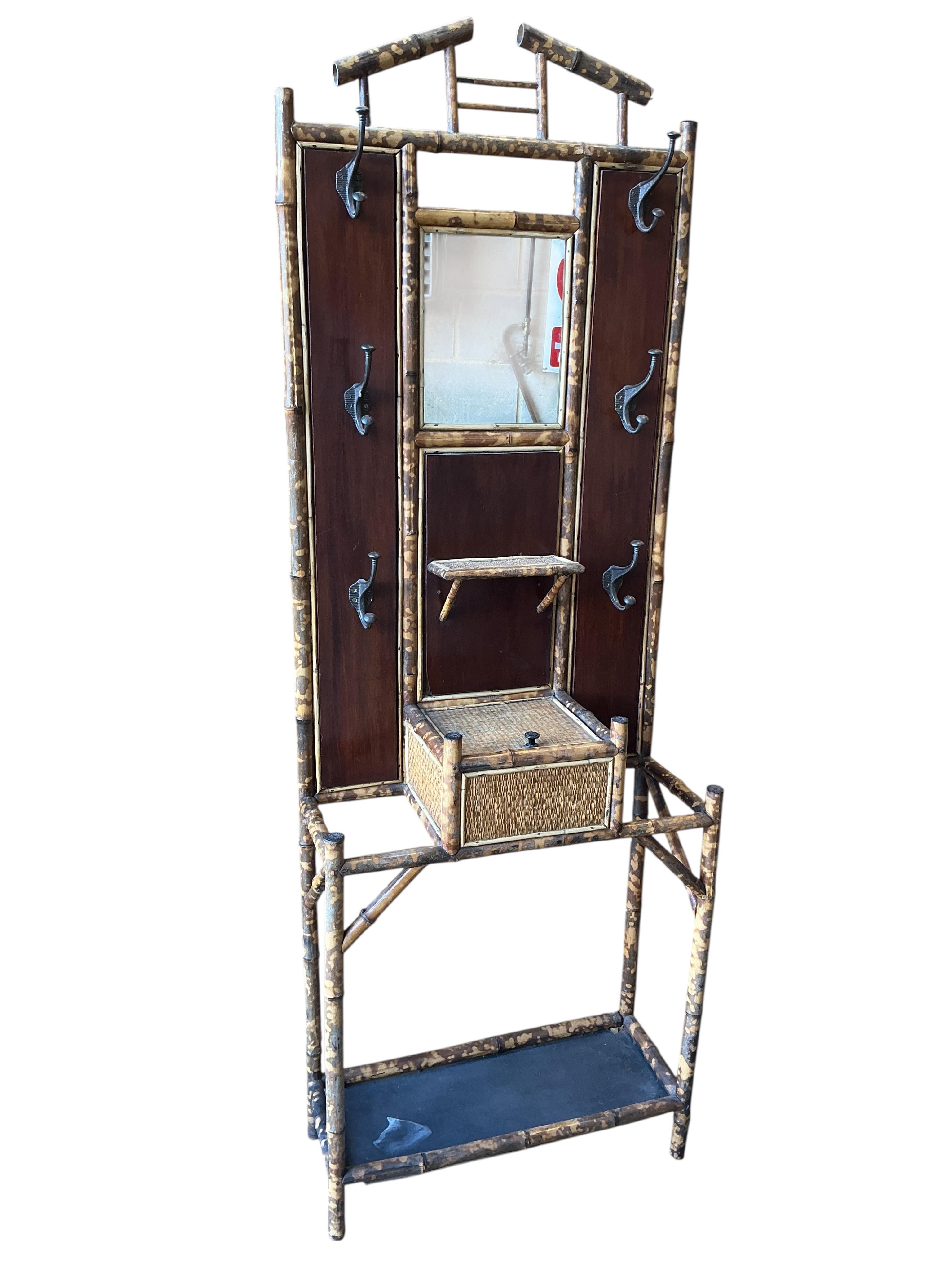 A Victorian and later bamboo hall stand, width 68cm, height 194cm
